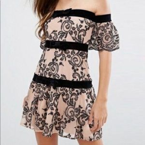 For love and lemons black and nude lace dress